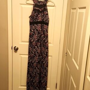 Emerald Sundae maxi floral dress with mesh cut outs and lace details.